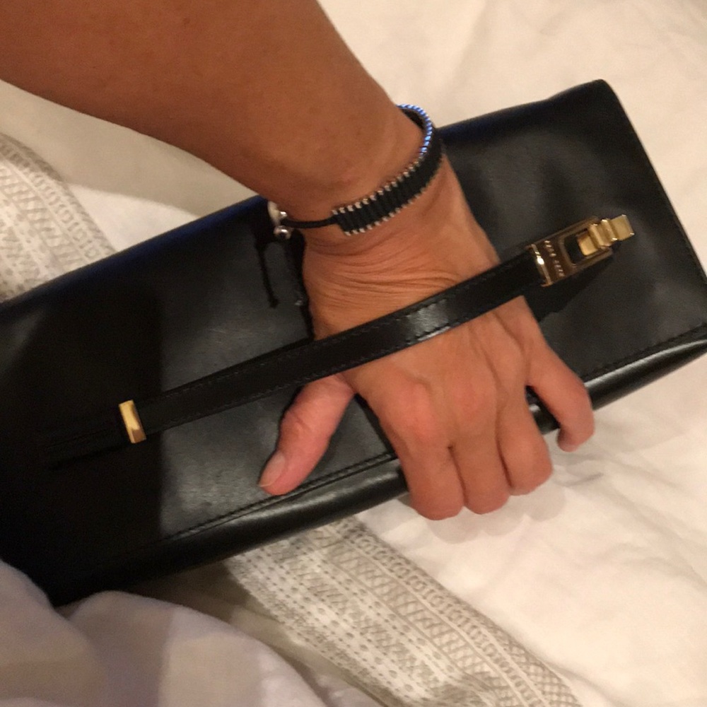 Hugo Boss clutch, 9/10 condition.Immaculate inside